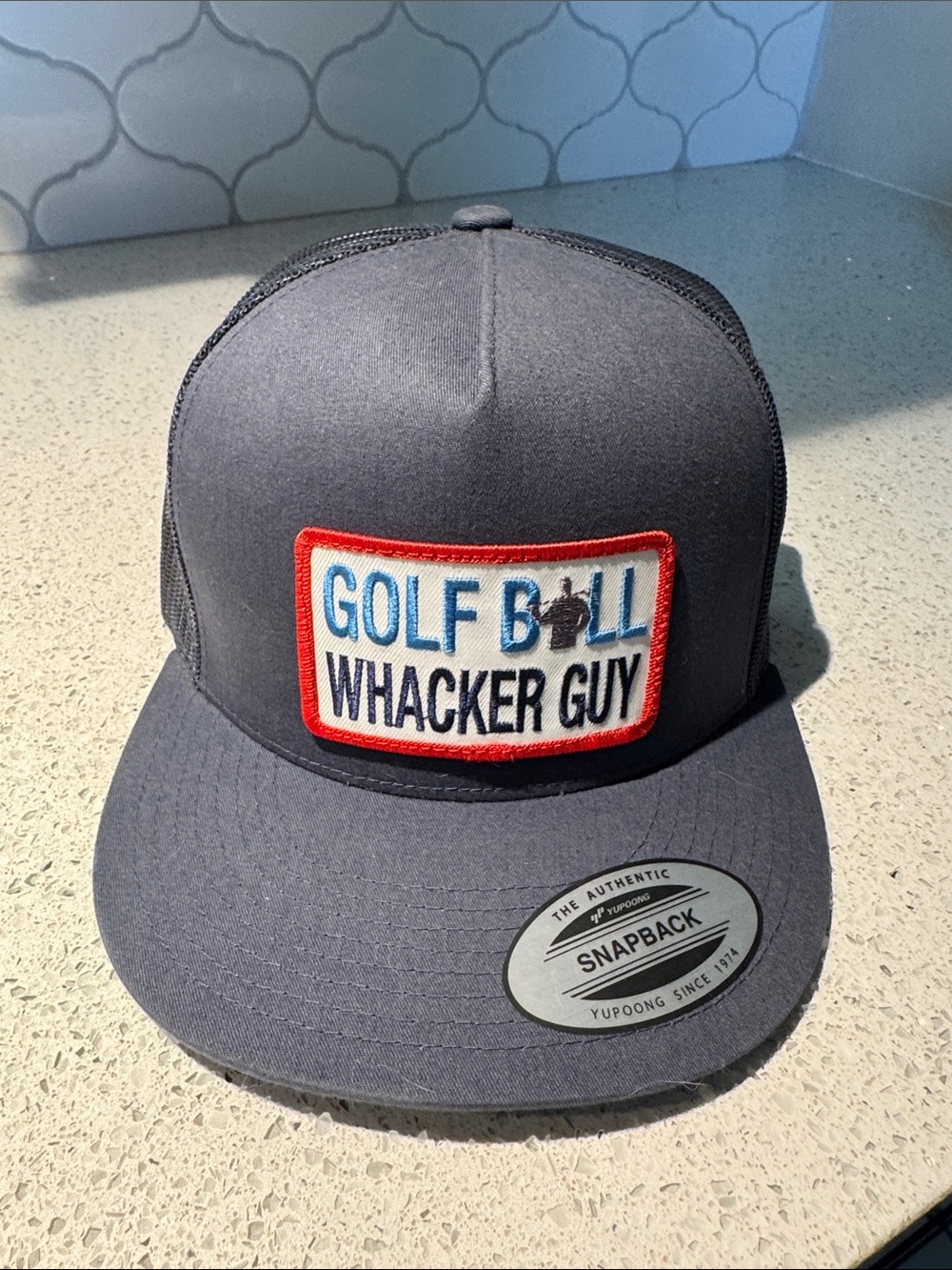 Yupoong Snapback 'Golf Ball Whacker Guy' Trucker Hat - Gray